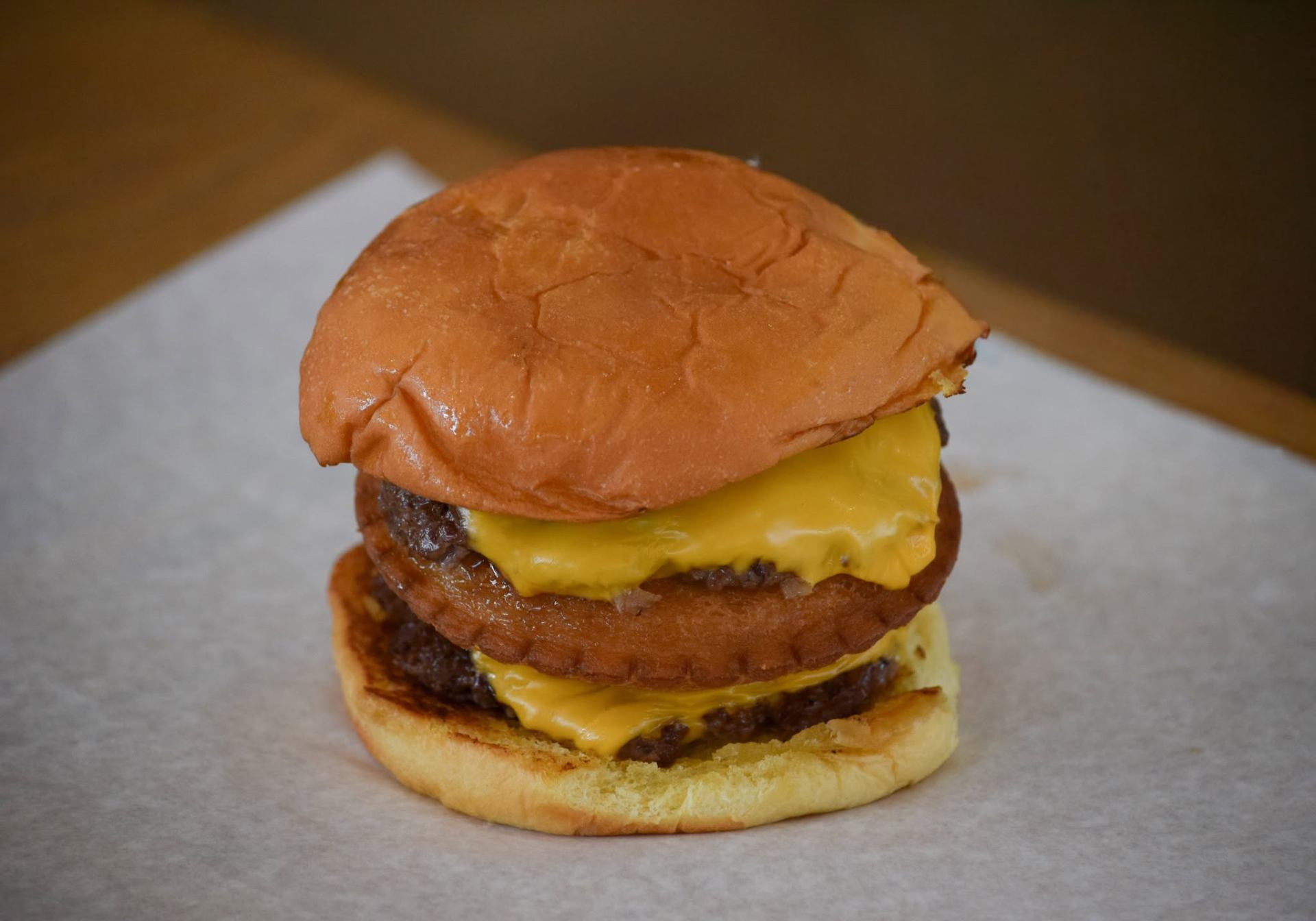 Smash burger stacked with melted cheese